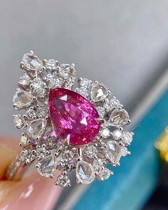 Bienvenue chez Odyssée Joaillerie, nous nous spécialisons dans le diamant coloré,  et les bagues de fiançailles. Nous offrons un grand choix: blanc, ou jaune, ou rose, platine,  nos bijoux sont finement fabriqués pour une qualité exceptionnelle! Symbole d'amour par excellence, le diamant est une belle preuve d'amour. Le joyau de vos rêves est le vôtre! Détails : Marque: Odyssée Joaillerie Métal : or blanc 18k  * Pierre centrale : Saphir Rose non chauffé 2,01ct  * Pierres latérales: Diamants inco Proof Of Love, High Jewelry Ring, Colorless Diamond, Emerald Jewelry, Love Symbols, High Jewelry, Pink Sapphire, Cocktail Rings, Ring Verlobung