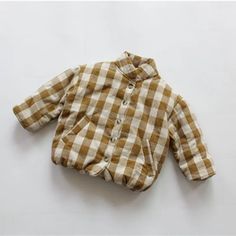 Introducing the Unisex Kids Plaid Padded Jacket, a cozy winter essential for your little ones. This jacket is crafted with a cotton-polyester blend material, ensuring comfort and durability. The single-breasted closure and mandarin collar add a touch of sophistication, while the pockets provide practicality. With its woven plaid pattern and regular fit, this jacket is suitable for boys and girls aged 2–6 years. Keep your kids warm and stylish this winter with this adorable outerwear piece. ❄️🧥 Kids Fall Fashion, Stylish Baby Clothes, Kids Plaid, Baby Fits, Plaid Coat, Stylish Baby, Baby Warmer, Cotton Pads, Clothing Size Chart