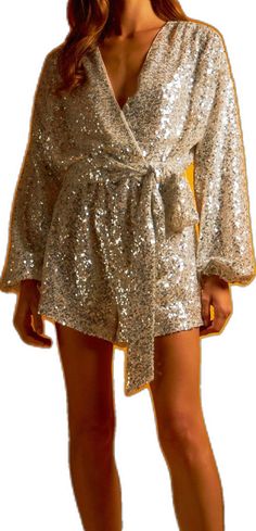 Winter Party Dress With Belt, Belted Party Dresses For Winter, Chic Metallic Sequin Dress For Holiday Party, Chic Metallic Sequin Dress For Party, Chic Holiday Sequin Glitter Dress, Chic Holiday Sequin Dress, Chic Holiday Sequin Dress With Glitter, Champagne Sequin Dress For Date Night, Chic Metallic Sequin Dress