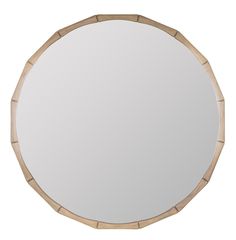 a round mirror with bamboo trim around the edges