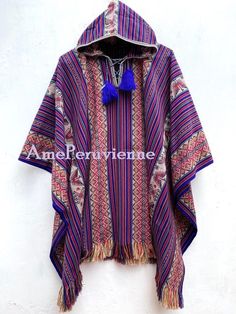 Our traditional poncho has been made with the quality and rustic appereance of the natural Alpaca and designed in a very particular and nice style. Its an original versatile garment from the andes of Peru! MATERIAL: Alpaca Wool. Alpaca Wool is hypoallergenic, light and warm. Its fibers contain microscopic air bags that make the garments light and delicate while acting as excellent insulators. WARM & SOFT: It will surely keep you warm on cold winter days. You will find that the materials really b Bohemian Alpaca Shawl Cape, Handmade Alpaca Bohemian Poncho, Handmade Bohemian Alpaca Poncho, Bohemian Handwoven Poncho For Winter, Artisan Handwoven Winter Poncho, Traditional Alpaca Cape For Winter, Traditional Alpaca Winter Cape, Artisan Winter Poncho For Festival, Traditional Alpaca Shawl Cape