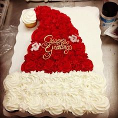 a cake that is shaped like a santa hat