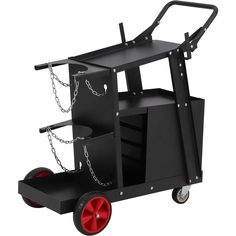 a black cart with red wheels and chains on it