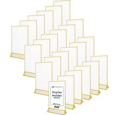 the display holder is white with gold trimmings and holds six different sized displays