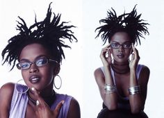 two women with dreadlocks are posing for the camera