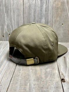 7 Panel Upland Patch All Loden Cap Cotton Twill Front Structured 7 Panel Crown Brass Metal Eyelets Mid/High Crown Flat Bill Premium Leather Strapback Crown Cap, Outdoor Style, Brass Metal, Cotton Twill, Crown, Brass, Leather