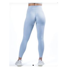 New Without Tag Light Blue Fitted Athleisure Leggings, Fitted Light Blue Athleisure Leggings, Light Blue Fitted Sports Pants, Fitted Light Blue Sports Pants, Light Blue Athletic Fit Pants For Sports, Light Blue Fitted Gym Bottoms, Light Blue Fitted Bottoms For Gym, Light Blue Compression Activewear, Light Blue Fitted Gym Pants