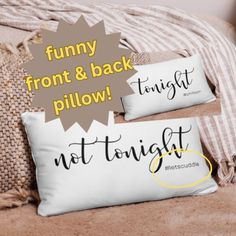 two pillows sitting on top of a bed with the words funny, front and back pillow