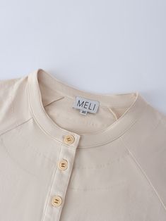 Our Henley Drawstring Tee in tan is the perfect combination of style and comfort. The drawstring style with the buttons makes this tee a must have in your closet! The tan color effortlessly makes this tee stand out even more! Casual Beige Top With Buttons, Beige Relaxed Fit Top With Buttons, Casual Beige Tops With Button Closure, Casual Beige Button-up Tops, Neutral Cotton Button-up Tops, Cotton Cream Tops With Button Closure, Cream Cotton Tops With Button Closure, Beige Relaxed Fit Button-up Top, Beige Button-up Top For Everyday