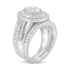 Give her a stunning symbol of your love with this vintage-inspired diamond bridal set. Fashioned in cool 10K white gold, the outstanding engagement ring features an oval-shaped composite of diamonds - the largest a 1/10 ct. stone - wrapped in double frame of diamonds and intricate milgrain. The split multi-row shank shimmers with diamonds and milgrain borders. Seal your vows with the coordinating diamond- and milgrain-lined wedding band. Captivating with 1-1/4 cts. t.w. of diamonds and a bright polished shine, this bridal set is destined to be treasured. Center Stone Engagement Ring, Double Frame, Peoples Jewellers, Diamond Bridal Sets, Stone Wrapping, Stone Engagement Rings, Jewelry Repair, Bridal Set, Oval Diamond