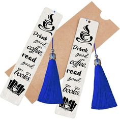 two bookmarks with blue tassels on top of each one and the words drink coffee read