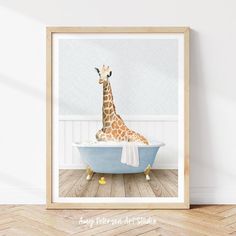 a giraffe is sitting in a bathtub