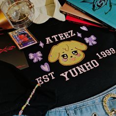 Stay warm and stylish with our Ateez Yunho inspired embroidered sweatshirt! This trendy sweatshirt is perfect for Ateez fans who want to show off their love for their favorite K-pop idol while keeping cozy and comfortable. Crafted from high-quality materials, this sweatshirt is designed to last you through the seasons. The intricate embroidery on the front of the shirt showcases Yunho's Aniteez character, adding a unique touch to your wardrobe.  The soft and warm fabric ensures that you'll stay Trendy Winter Sweater With Embroidered Logo, Cute Cotton Sweatshirt For Streetwear, Cute Cotton Sweater For Streetwear, Trendy Embroidered Sweater For Winter, Cute Crew Neck Sweater With Embroidered Logo, Trendy Sweater With Embroidered Logo For Streetwear, Trendy Embroidered Logo Sweater For Streetwear, Trendy Streetwear Sweater With Embroidered Logo, Trendy Letter Embroidered Sweater For Winter