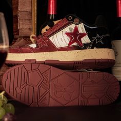 This Burgundy Sneaker draws inspiration from red wine, with a unique design that showcases a star filled with specially crafted oil to mimic the look and movement of wine. Featuring cork-styled accessories and interchangeable Velcro, it brings a playful twist to any outfit. Perfect for the holiday season, parties, or as a thoughtful gift, this sneaker offers both style and fun.  Available in two versions:    Standard Edition  – Classic design and comfort.   LIMITED EDITION  – Features finer deta Luxurious Packaging, Wine Shoes, Motorcycle Riding Boots, Sneakers Drawing, Burgundy Sneakers, Back Bag, Sneaker Slippers, Climbing Shoes, Riding Gear