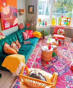 a living room filled with lots of colorful furniture