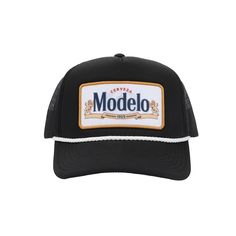 Embark on a style journey with this black Modelo trucker hat, a fusion of fashion and beer culture. This custom-designed hat, featuring the iconic Modelo logo, is the perfect accessory for those who appreciate great taste. Crafted with high-quality polyester and adjustable snapback closure, this officially licensed hat ensures a comfortable fit for your beer-themed adventures. Hand wash in cold water and lay flat to dry to keep the Modelo spirit fresh. Elevate your style with this unique blend o Black Trucker Hat, Beer Theme, Shipt Shopper, Logo Black, Adjustable Hat, Online Purchase, Lay Flat, Brand Logo, Casual Style