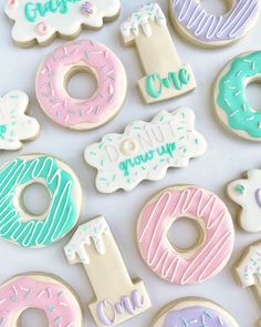 the word cookies is spelled out with cookie cutters, candy bars and other items