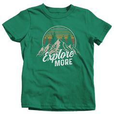 "Kids Hiking T Shirt Hiker Shirt Explore More Mountains Shirt Hiker Gift Camping Tee Mountains Shirt Boy's Girl's Youth Get there when you do! Hiking can be so freeing. This t shirt is perfect for any hiker or camper. It features vintage colors, a mountain range and distressed fonts. It simply reads 'Explore More'. Made of soft, ring spun cotton. Includes a drawstring cotton gift bag. Direct to garment printed using the latest technology. Soft, ring spun cotton. Please check out my other Etsy It Pre-shrunk Green T-shirt For Camping, Green Graphic Tee For Outdoor, Green Graphic Print T-shirt For Camping, Green Cotton Tops For Camping, Green Pre-shrunk T-shirt For Camping, Green T-shirt For Outdoor Activities, Green Graphic Tee For Outdoor Activities, Green Crew Neck Top For Camping, Green Letter Print T-shirt For Camping