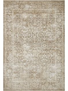 an antique style rug in beige and brown tones