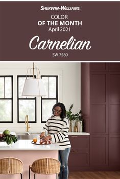 a woman standing in front of a kitchen counter with an orange on it and the words shelving williams color of the month