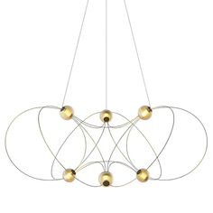 a chandelier with five balls hanging from it's center and four circles on each end