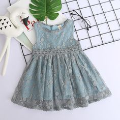 Girls Lace Mesh Dress Round Neck Sleeveless Princess Skirt - PrettyKid Blue Sleeveless Dress For Party, Sleeveless Lace Dress For Dress-up Occasions, Sleeveless Lace Dresses For Dress-up, Blue Fitted Sleeveless Dress For Dress-up, Light Blue Sleeveless Dress For Spring Party, Light Blue Sleeveless Dress For Dress-up Occasions, Light Blue Lace Sleeveless Dress, Light Blue Sleeveless Lace Dress, Blue Lace Sleeveless Dress