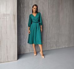 Get ready to turn heads with this stunning Midi Green Casual Work Dress! 🌿 Perfect for every occasion from business meetings to cocktail parties, this dress is a must-have in your wardrobe. - **Elegant A-line Swing Style The flattering silhouette highlights your natural waist and flows gracefully. - **Chic Lantern Sleeves 3/4 sleeves add elegance while allowing comfort. - **Comfortable Fit Elastic waistband ensures you can move freely all day long. - **Versatile V-neck Design Ideal as an office midi dress or a fall cocktail dress. - **Luxurious Silk Fabric Feel the smooth texture against your skin, perfect for spring, autumn, and winter. With its hidden side zipper and detachable narrow tie belt, this green birthday dress offers both style and functionality. Whether it's a casual workday Elegant 3/4 Sleeve Dress For Wedding Guest, Elegant Cocktail Dress With 3/4 Sleeves, Elegant Party Dress With 3/4 Length, Elegant 3/4 Length Party Dresses, Elegant Green Dress With 3/4 Sleeves, Chic Midi Dress For Party, Formal Green Dress With 3/4 Sleeves, Chic 3/4 Length Evening Dresses, Elegant Workwear Dress, 3/4 Length