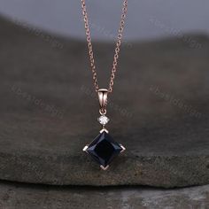 Here we have a princess cut black onyx necklace in rose gold. For those who are looking for black gemstone jewelry which is handcrafted in details, this unique onyx necklace would be a perfect choice for you. Black Fine Jewelry Necklace For Wedding, Black Fine Jewelry Necklaces For Wedding, Black Gemstone Necklace For Wedding, Formal Black Square Pendant Necklace, Formal Black Necklace With Square Pendant, Black Square Pendant Necklace For Formal Occasions, Elegant Black Square Pendant Jewelry, Anniversary Necklace, Black Onyx Necklace