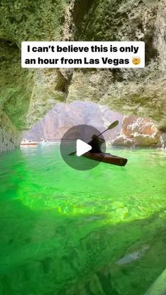 a person in a kayak with green water