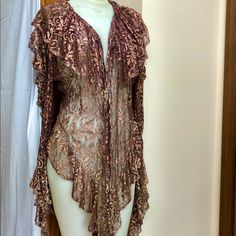 This Beautiful 1970’s/80’s Vintage Sonda Nyc Design Is Full Of Ruffles, Romance & Rock N Roll. Color Was Tough To Photograph So Please Allow A Little Leeway In How Your Screen Depicts It. I Can Best Describe It As A Coppery/Mauve/Dusty Rose Color. A Beautiful And Sophisticated Color. Made In Nyc Sonda Was A Highly Respected Clothing Designer Popular In Nyc Back In The Days Of Glam, New Romantic And Punk, And Her Pieces Are Extremely Difficult To Find. Fits Small To Medium Sizes Fitted Ruffled Cardigan For Party, Pink Fitted Cardigan For Party, Party Long Sleeve Ruffled Cardigan, Pink Fitted Open Front Top, Party Cardigan With Ruffles And Long Sleeves, Pink Open Front Fitted Tops, Long Sleeve Ruffled Party Cardigan, Nyc Design, Different Aesthetics