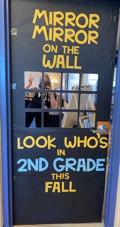 a door with the words mirror mirror on the wall and look in who's 2nd grade this fall