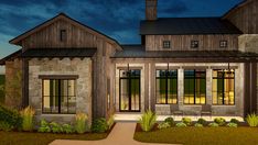 an artist's rendering of a house at night with the front porch lit up