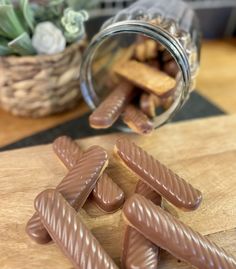 some chocolate candies are sitting on a table