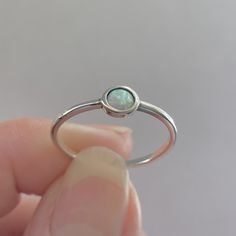 *  Silver Lab White Opal Full Moon Ring, Dainty Ring, Moon Ring, Opal Ring, Boho Ring, Sky Ring Statement Ring, Love Ring, Boho Ring, Delicate Ring, Round Ring, may wear as midi, pinky or thumb ring, 925 Stamped *  White opal is a calming and protective stone, absorbing negative emotions and bringing a sense of peace to an overactive mind *  Perfect gift idea for any occasion: birthday, anniversary, engagement, graduation, bridesmaid, Mother's Day, Valentine's Day, Christmas, promise. *  Your pu Handmade Minimalist Round Opal Ring, Nickel-free Birthstone Promise Ring, Nickel-free Round Birthstone Promise Ring, Silver Midi Rings With Birthstone, Silver Round Midi Rings With Birthstone, Spiritual Round Opal Promise Ring, Spiritual Adjustable Opal Ring, Adjustable Round Opal Ring, Spiritual Style, Adjustable Round Opal Ring Spiritual