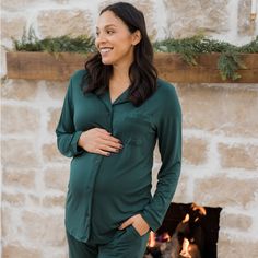 The pajama set you’ve been dreaming of. This super-soft classic pajama set is made from premium, temperature-regulating bamboo fabric and is great whether you’re pregnant, nursing, parenting, working from home, lounging… (you get the picture). Plus, buttons = nursing-friendly!  Long sleeves and pants for colder weather Breathable fabric for warmer weather Button-down nursing access Elastic waistband for size fluctuations Convenient pockets Delicate piping Green Long Sleeve Sleepwear For Fall, Relaxed Fit Green Sleepwear For Fall, Green Relaxed Fit Sleepwear For Fall, Fitted Green Sleepwear For Loungewear, Green Fitted Sleepwear For Loungewear, Green Long Sleeve Sleepwear For Relaxation, Fitted Long Sleeve Green Sleepwear, Maternity Pajama Set, Nursing Pajama Set