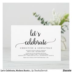 a white card with the words let's celebrate written in black ink on it