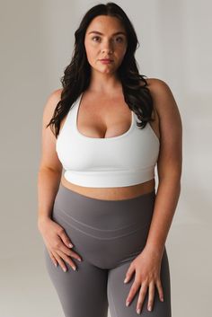 Our Revive Racer Bra is crafted with functionality and performance in mind, whether you're on a stroll or pushing through an intense workout session. With medium support and compression, this bra enhances your natural curves while providing the comfort you need. Full Coverage Light Support Sports Bra In Athleisure Style, Full Coverage Light Support Athleisure Sports Bra, Athleisure Full Coverage Sports Bra With Light Support, Medium Support Full Coverage Workout Bra, Stretch Racerback Sports Bra With Medium Bust Support, Athleisure Fitted Bra With Medium Bust Support, Athleisure Training Bra With Removable Pads, Racerback Sports Bra For Pilates With Removable Pads, Workout Bra With Medium Support And Full Coverage