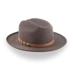 Description Materials Craftsmanship Hat Care Shipping Returns Product Description A Premium Quality Open Road Fedora Transform your look with the Tatooine, an open road fedora expertly crafted for both style and comfort. Made from premium rabbit fur felt, this hat features a 4 3/4" cattleman crown and a 2 5/8" raw-edge rolled brim, providing a distinctive and elegant silhouette. The smooth mélange finish and leather hat belt add a touch of sophistication, making it the perfect accessory for any Homburg Hat, Gambler Hat, Mens Hats Fashion, Fedora Hat Men, Grey Fur, Homburg, Chapeau Cowboy, Trilby Hat, Leather Hat