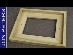 a wooden frame sitting on top of a table