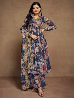 Introducing the stunning "attractive blue floral printed chiffon festival wear palazzo suit" from Ethnic Plus, a must-have addition to your ethnic wear collection. Made from high-quality chiffon material, this suit features intricate floral print, zari work, and sequin work, making it the perfect outfit for festivals, weddings, and other special occasions. The set includes a fully stitched blue palazzo suit with a matching chiffon palazzo and dupatta, all adorned with beautiful floral prints and Engagement Gown, Lehenga Crop Top, Bandhani Dress, Lehenga Choli Wedding, Western Wear Dresses, Floral Lehenga, Party Wear Lehenga Choli, Palazzo Suit, Cocktail Wear