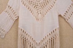 "Fringe Crochet womens top ,crochet fringe beach top, Summer Fashion Women's tops,Womens Blouse **.♥.**'.♥.**'.♥.**'.♥.**'.♥.**'.♥.** This crochet beach top made from soft pure cotton. It functions as a fun summer top paired with shorts or jeans and as a bikini for those heady summer beach days! Great for the holiday at the seaside.Unique look **.♥.**'.♥.**'.♥.**'.♥.**'.♥.**'.♥.** Measured 30\" in length with tassels, stretched to 43\" in bust circumference If you need it to be made in a differe Beachwear Tops With Fringe For Beach, Beachwear Fringe Tops For Beach, Beige Fringed Tops For Festival, Beige Fringe Tops For Summer, Beige Fringe Summer Tops, Beige Fringe Tops For Festival, Tassel Tops For Beach Season Cover-up, Summer Beach Tops With Fringe, Bohemian Fringe Crochet Top For Spring