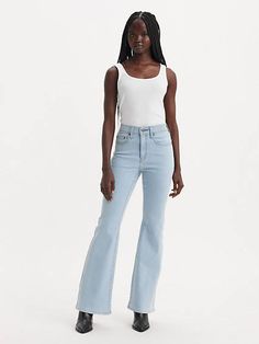 Our 726 High-Rise Flares are designed with a slim fit through your hip and thigh before flaring at the knee. Part of our signature ‘Lot 700’ fits, these jeans are designed to flatter;all day, every day. For those days when skinny jeans won't do Features a waist-defining high rise Finished with a flared leg Authentic denim character enhanced with supersoft stretch. For jeans that'll leave you starry-eyed. That's Levi's® Stellar Stretch. Thanks to excellent built-in recovery, they champion your cu Levis 726 Flare, Fitted Flare Jeans With Five Pockets, High Waist Fitted Flares With Five Pockets, Levi's High-rise Flare Jeans With Five Pockets, Levi's High Rise Flare Jeans With Five Pockets, Levi's High Rise Trendy Flare Jeans, Levi's Trendy High Rise Flare Jeans, Trendy Levi's High Waist Flare Jeans, Trendy High Rise Levi's Flare Jeans