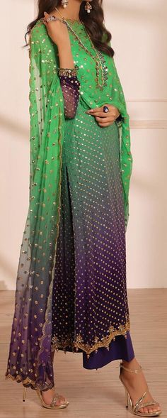 Product Description:  Signature kundan and crystal details on the neckline, sleeves, and hem complement the gold sequin work on a shaded foundation. matched with straight, raw silk pants and a sequined, scalloped chiffon dupatta. Fabric: Chiffon Color: Green Can be customized in any color Includes:  Shirt Pants Duppata Ombre Outfits, Embellished Outfit, Mehndi Outfit, Embellished Clothing, Indian Designer Suits, Pakistani Fashion Casual, Pakistani Wedding Outfits, Dream Wedding Ideas Dresses, Pakistani Bridal Wear