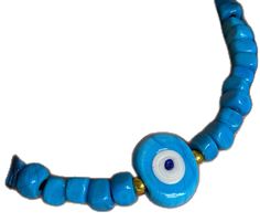 Handmade Turquoise Necklace With Oval Beads Gift, Turquoise Evil Eye Bracelet With Round Beads, Turquoise Evil Eye Bracelet With Round Beads As Gift, Blue Evil Eye Bracelet With Round Beads, Blue Beaded Amulet Style Turquoise Necklace, Blue Beaded Turquoise Amulet Necklace, Blue Gemstone Beads Amulet Necklace, Handmade Blue Evil Eye Bracelet With Round Beads, Traditional Turquoise Beads For Beach