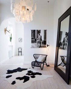 a white room with black and white decor