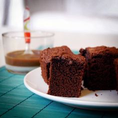 three pieces of chocolate cake on a plate