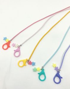 🦄 Lanyard with Star Charm 🦄 🦄 Leatherette Braided Lanyard - Light Weight 🦄 Finish with plastic lobster clasps : safe and easy to use 🦄 Star charm included 🦄 Available Color options : - Yellow - Coral - Pink - Purple - Mint 🦄 NECKLACE ONLY 🦄 Ship in 1 Business Day 🦄 A return may not be accepted due to safety matter. HAND MADE WITH LOVE with fast shipping! Mint Necklace, Pastel Girl, Mask Lanyard, Mask Holder, Kids Mask, Back To School Gift, Special Girl, School Gift, Back To School Gifts