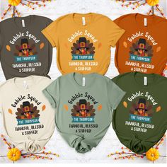 CREATE UNFORGETTABLE THANKSGIVING MEMORIES 🍂 with our personalized family shirts! ✨ About: Personalized Thanksgiving Shirts for Families Unique "Gobble Squad - Thankful, Blessed & Stuffed" design with custom family name. Perfect for Thanksgiving dinner, family gatherings, and memorable photos. High-quality prints on super comfortable shirts and sweatshirts. 👉 PREMIUM QUALITY OPTIONS: Bella Canvas: Soft, stylish t-shirt with a modern fit. 👕 PRODUCT DETAILS: Sizes: S-2XL. Styles: T-shirt, Long Thanksgiving Memories, Family Thanksgiving Shirts, Dinner Family, Comfortable Shirts, Turkey Thanksgiving, Family Thanksgiving, Funny Family, Squad Shirt, Thanksgiving Shirt