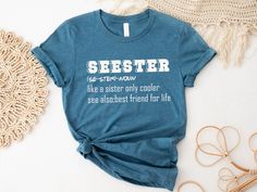 Best Sister Gift, Personalized Seester Definition Shirt, Seester Noun Shirt, Cool Sister Present, Big Sis Shirt, Little Sister Shirt, Sister -----How To Order----- 1-) Please, check and review all photos 2-) Choose your t-shirt size and color *Different styles of shirts may have different shades of same color choice due to different manufacturer brands. *For this reason, we recommend you to match shirts from the same styles if you want precisely matching colors (exa. Unisex, V-neck, Tank top, et Seester Shirt, Definition Shirt, Sister Shirt, Best Friends For Life, Best Sister, Big Sis, Sister Shirts, Matching Colors, Cricut Ideas