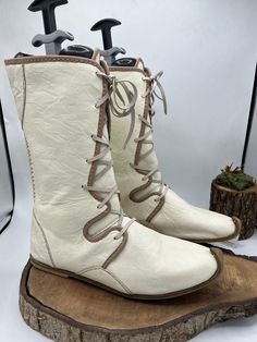 These are handmade genuine leather custom made men's boots  Our processing time 2-10 bussines days, But must of time we are shipping your order very earlier. ( express shipping, Fedex, Ups, Dhl, Tnt ) Made with natural leather and leather sole. Style is medieval leather men's boots. There is every size available. ** İf you need wider calves size please let us know your calf circle measurments. Photos are from day light. Very comfy and healty. Boots are taking your foot shape, flexible. %1oo Natu Handmade Leather Boots With Snip Toe, Western Style Lace-up Boots With Leather Sole, Western Lace-up Boots With Leather Sole And Round Toe, Handmade Leather Ankle Boots, Traditional Lace-up Boots With Rubber Sole, Leather Boots With Lacing And Plain Toe, Leather Festival Boots With Rubber Sole, Leather Boots With Rubber Sole For Festival, Leather Sole Lace-up Boots For Festival